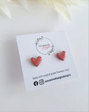 Load image into Gallery viewer, Coral Pink Gold Trim Heart studs
